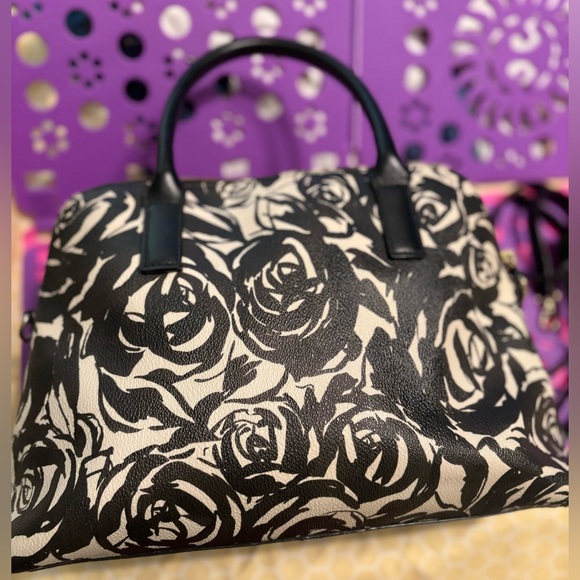 Kate Spade Black and Cream Floral Satchel comes with strap